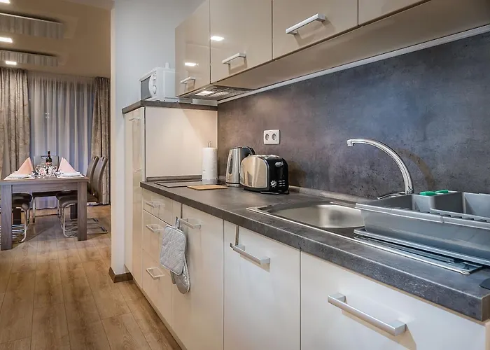 アパートホテル Apartmanovy Dom Krivan 3*